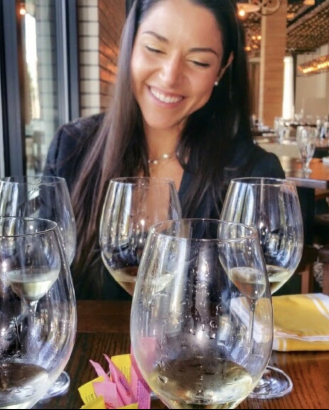 Pamela laughing over dinner